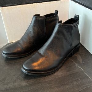 Gently used Tory Burch flat black leather ankle bootie